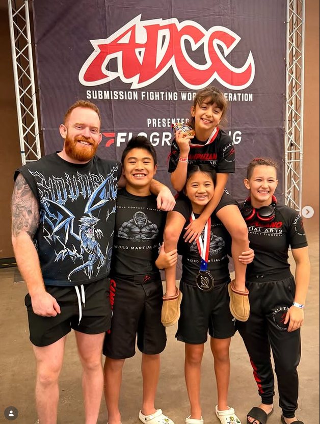 Blake Bradshaw with Campuzano MMA students at ADCC